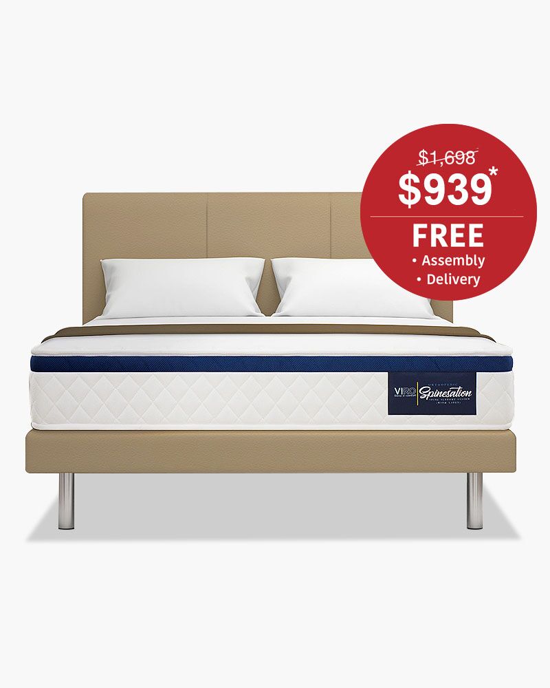 Beige bed with white and blue mattress at 939 dollar sale price with free delivery and assembly